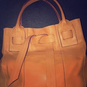 Tod’s Cognac leather purse